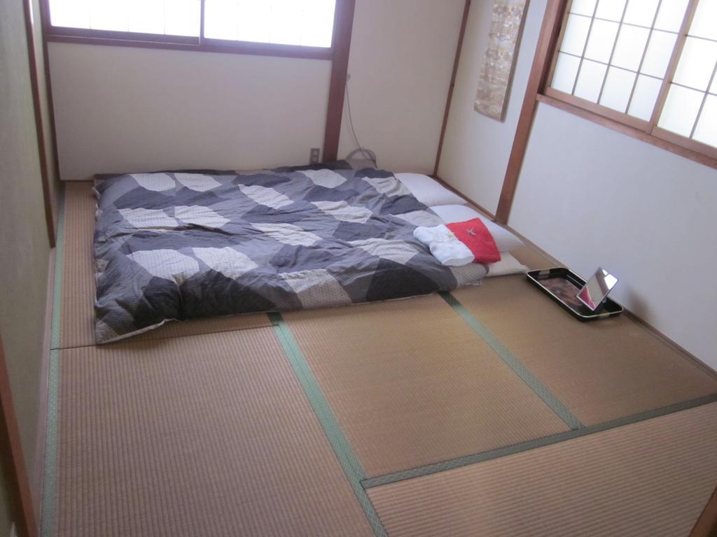 Enman Guest House Osaka Moriguchi Exterior foto
