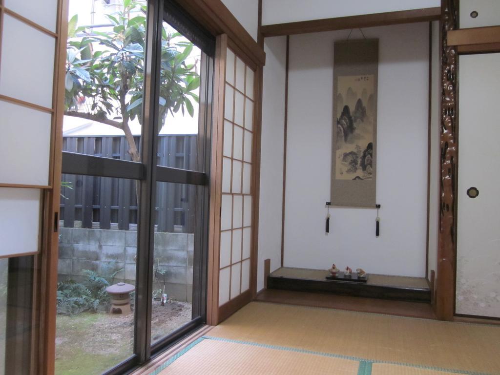 Enman Guest House Osaka Moriguchi Exterior foto